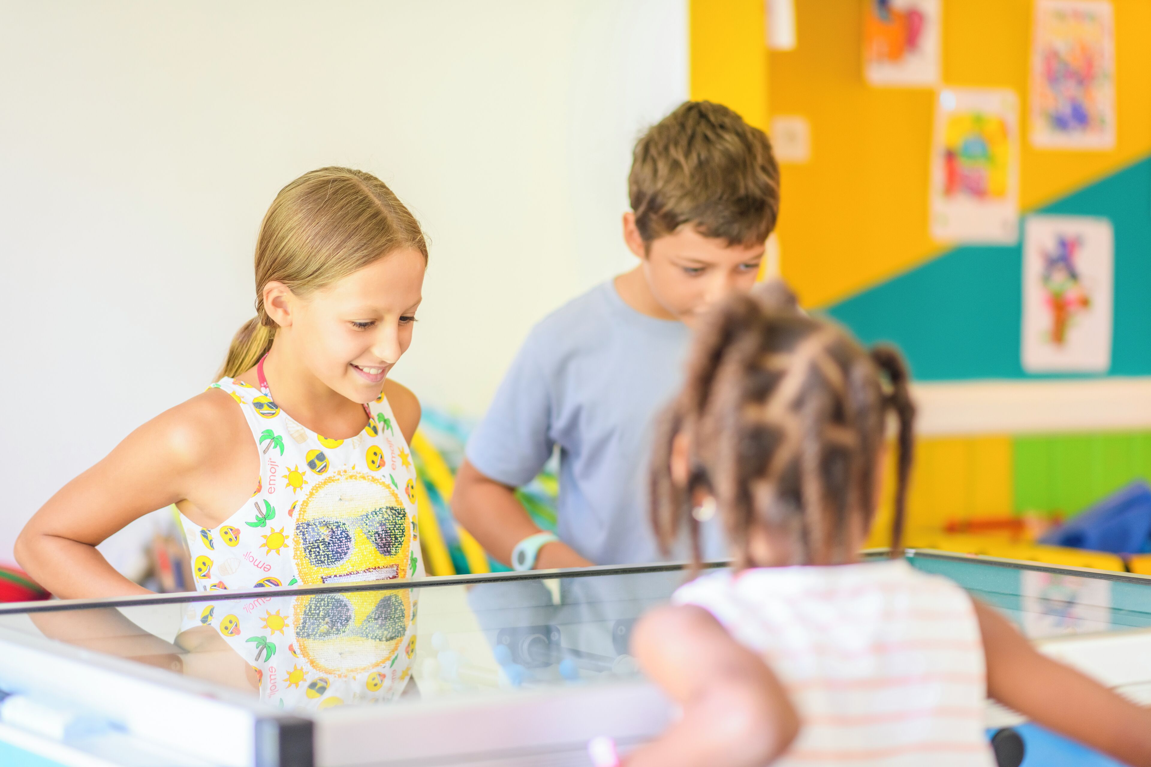 A classroom with children engaged in a learning activity.
