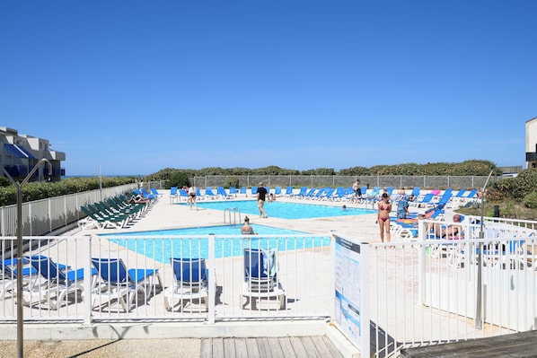 Seasonal outdoor pool, pool loungers