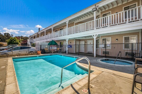 Outdoor pool, open 10 AM to 9 PM, pool umbrellas, sun loungers