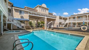 Outdoor pool, pool umbrellas, sun loungers