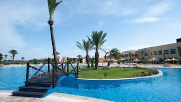 Indoor pool, outdoor pool, pool umbrellas, sun loungers
