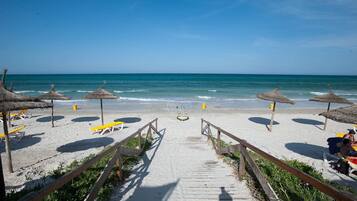 Private beach nearby, white sand, sun loungers, beach umbrellas