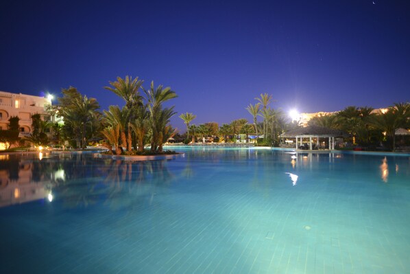 Indoor pool, outdoor pool, pool umbrellas, sun loungers