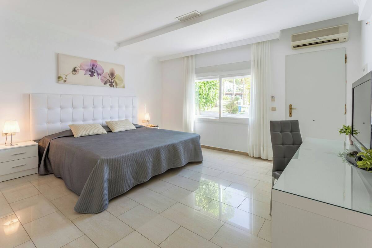 Habitación doble, 1 cama doble o 2 individuales | 1 dormitorio, cortinas opacas, wifi gratis y ropa de cama