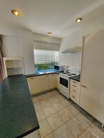 2 Bedrooms Apartment | Private kitchen | Fridge, microwave, electric kettle, toaster