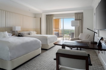 Premium bedding, down comforters, minibar, in-room safe at The Ritz-Carlton Orlando, Grande Lakes
