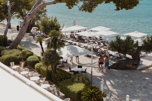 En la playa, toallas de playa