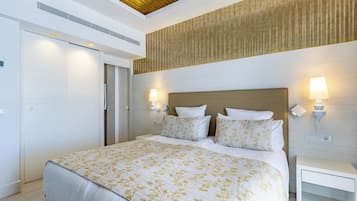 A hotel room with a bed, bedside lamps, a nightstand, and a wooden ceiling.