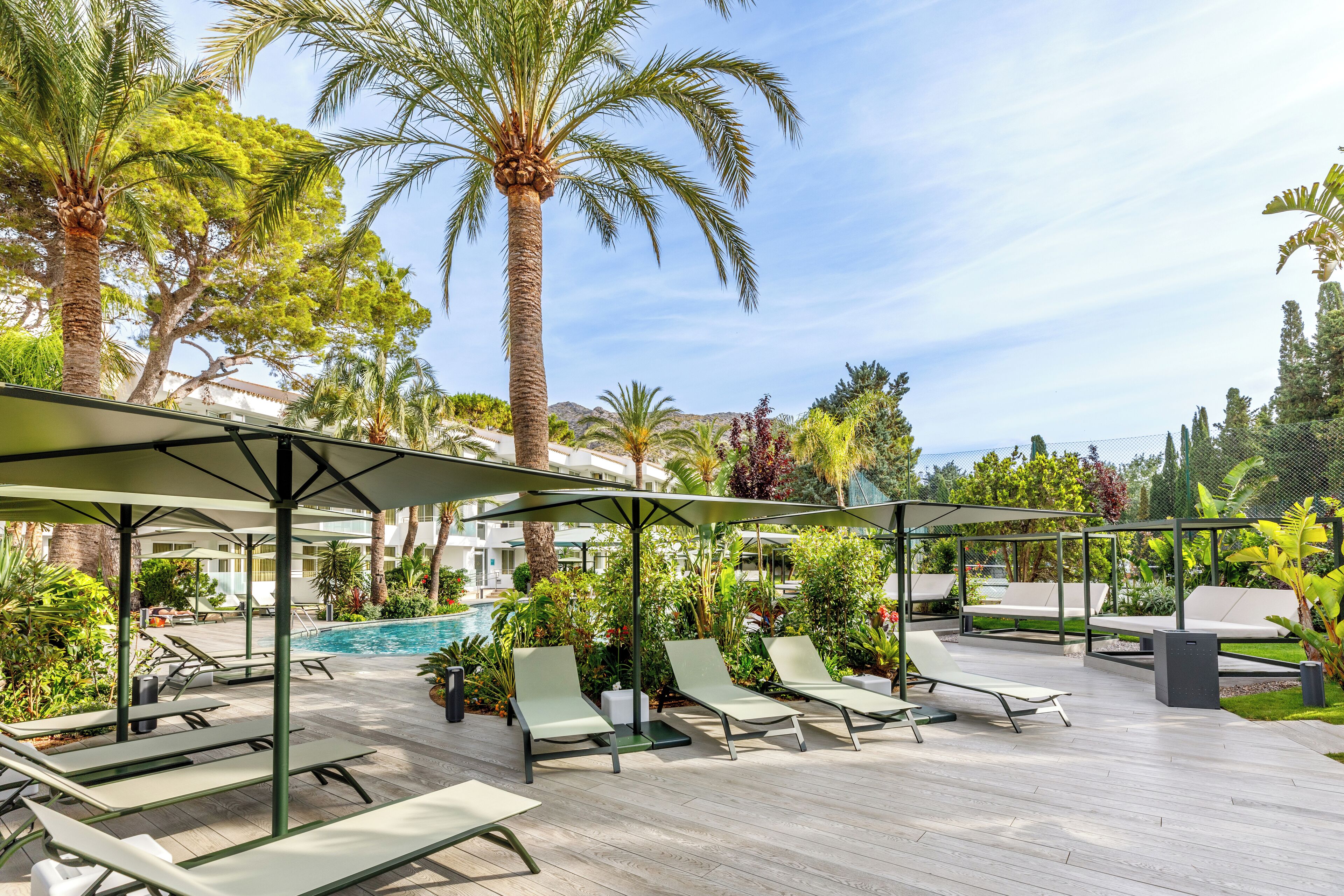 seasonal outdoor pool, open 8 am to 8 pm, pool umbrellas