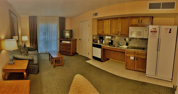 Full-size fridge, microwave, stovetop, dishwasher