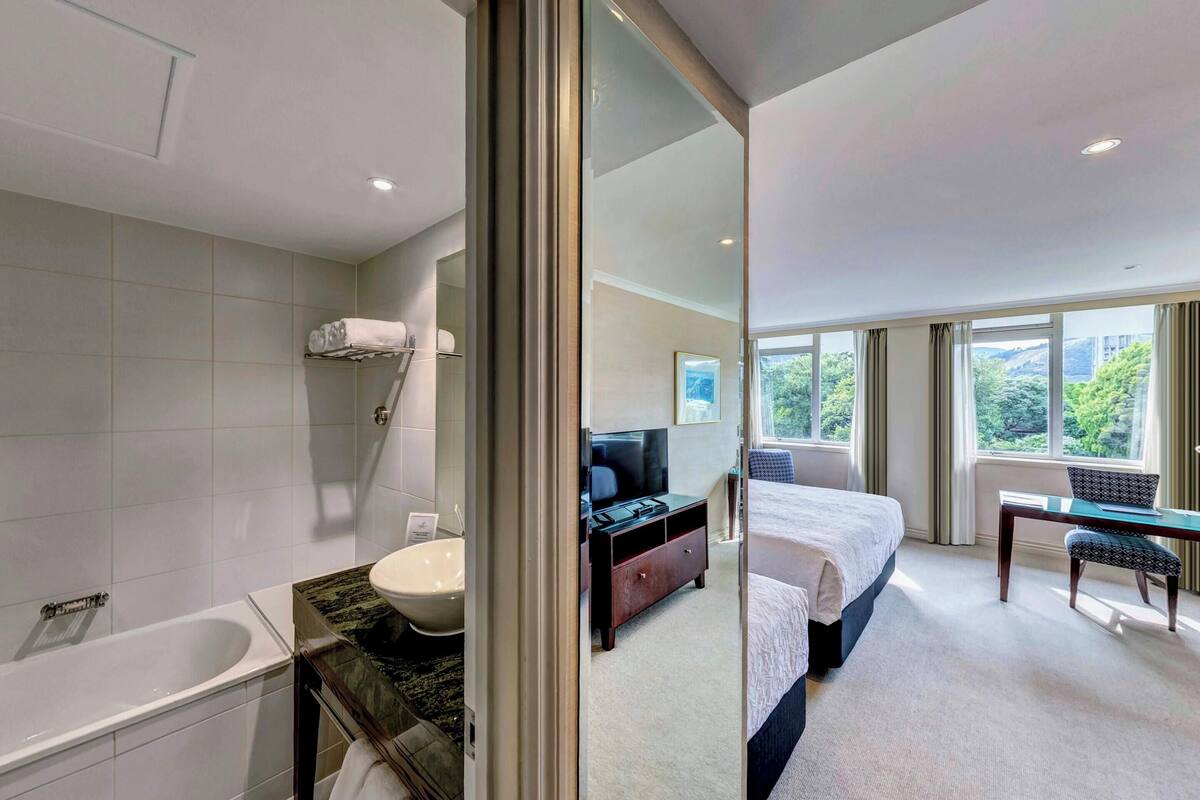 premium double or twin room, multiple beds | 1 bedroom, minibar, laptop workspace, iron/ironing board