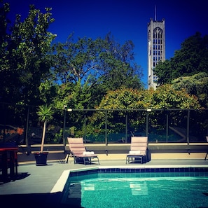 Seasonal outdoor pool, open 6:00 AM to 9:30 PM, pool umbrellas