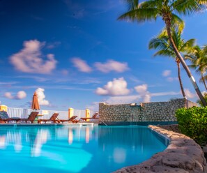 Outdoor pool, pool umbrellas, sun loungers