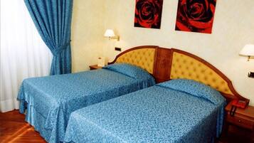 Superior Twin Room | Minibar, in-room safe, desk, laptop workspace