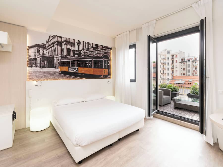 Camera Premium con letto matrimoniale o 2 letti singoli | Minibar, una cassaforte in camera, una scrivania, tende oscuranti