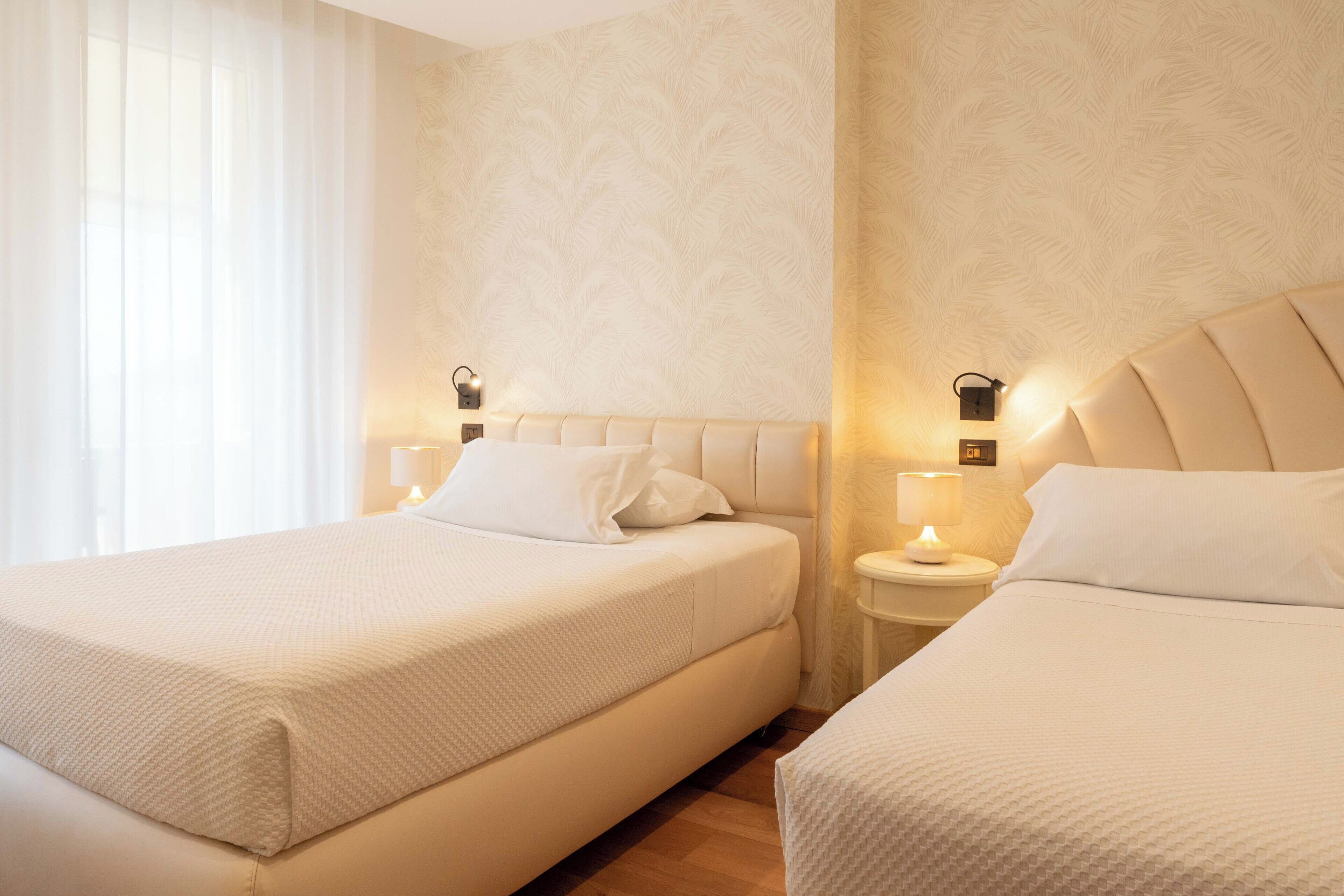 Chambre Triple Supérieure, plusieurs lits, vue mer