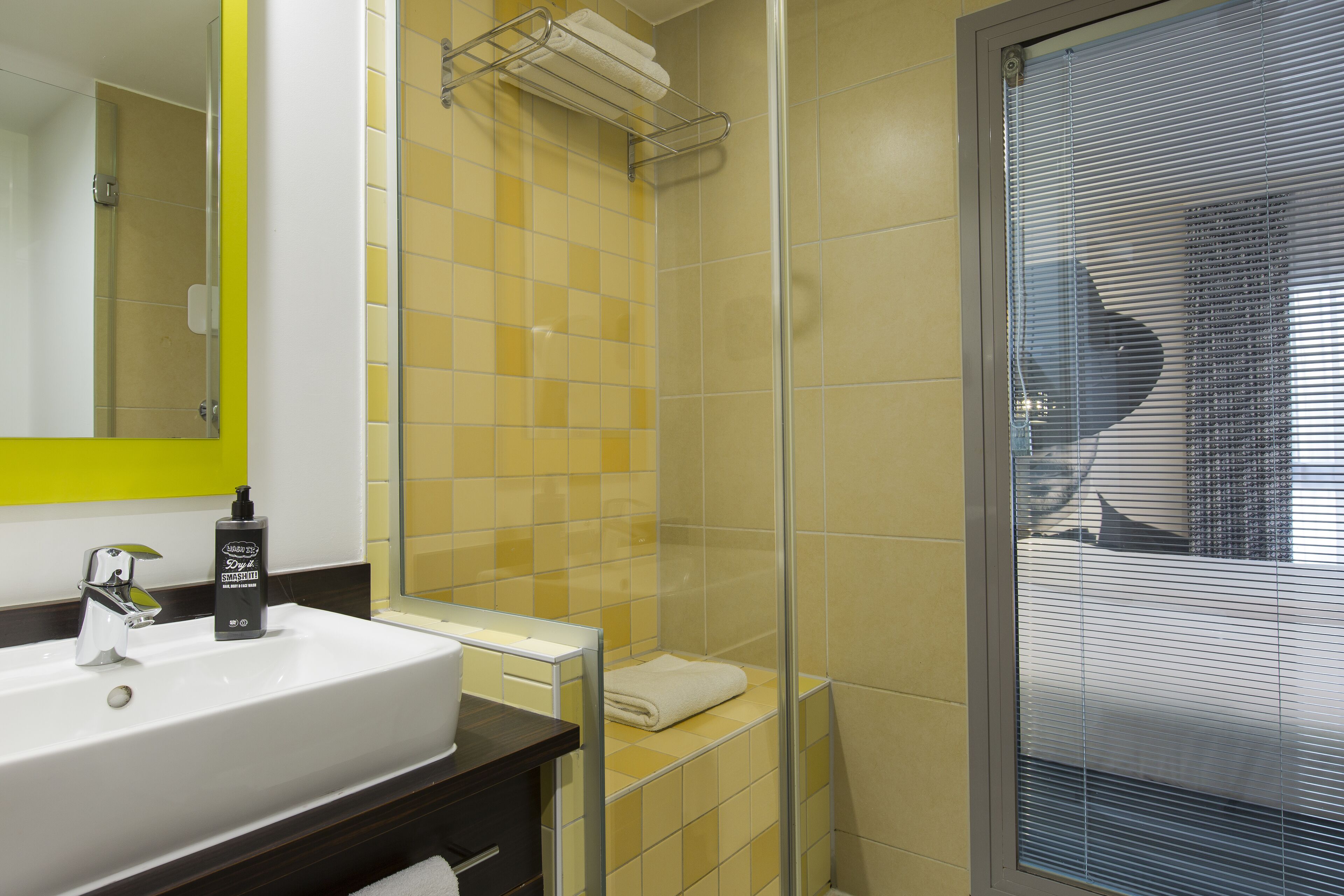 shower, eco-friendly toiletries, hair dryer, towels