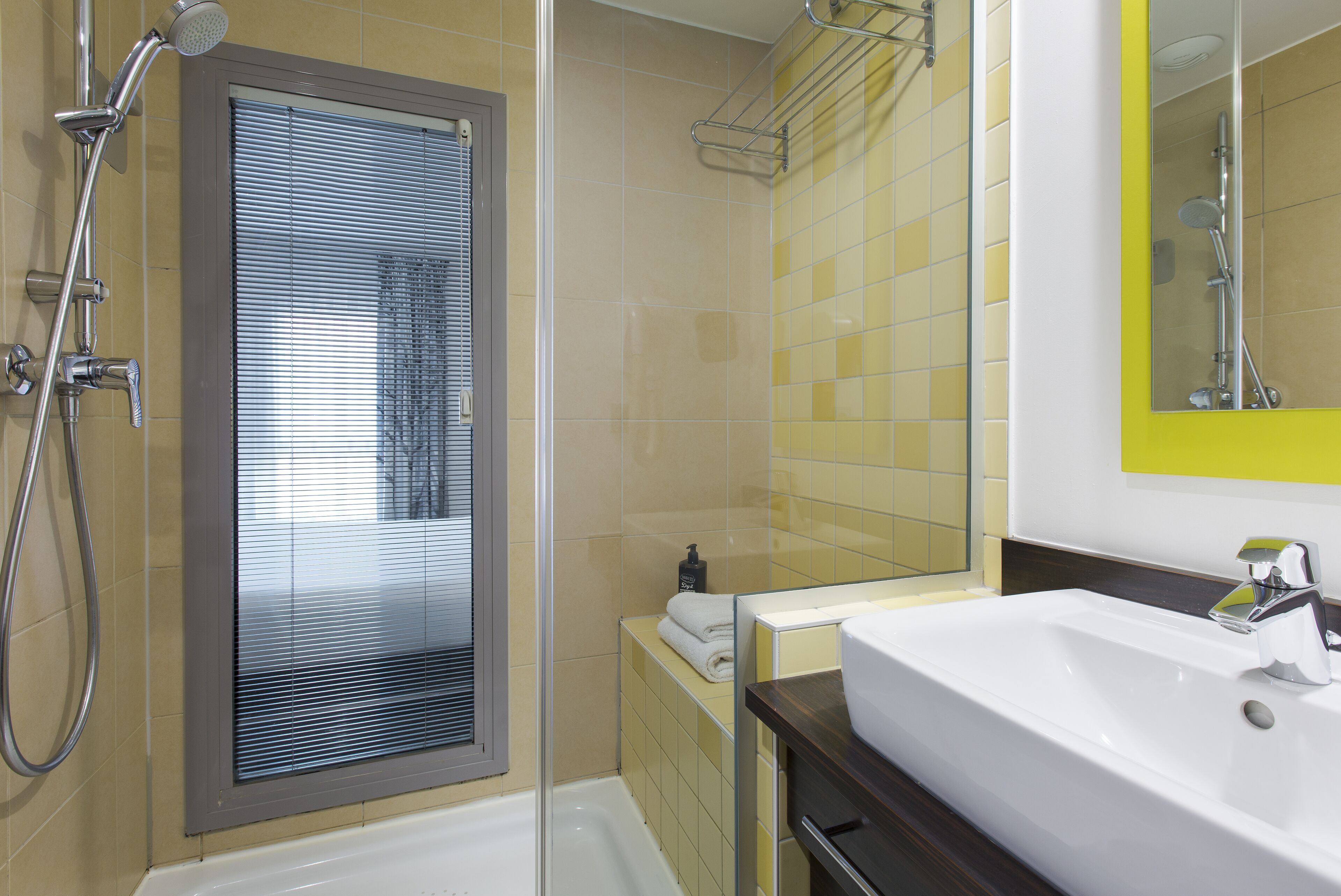 shower, eco-friendly toiletries, hair dryer, towels