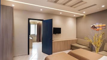 Family Room | 1 bedroom, minibar, in-room safe, desk