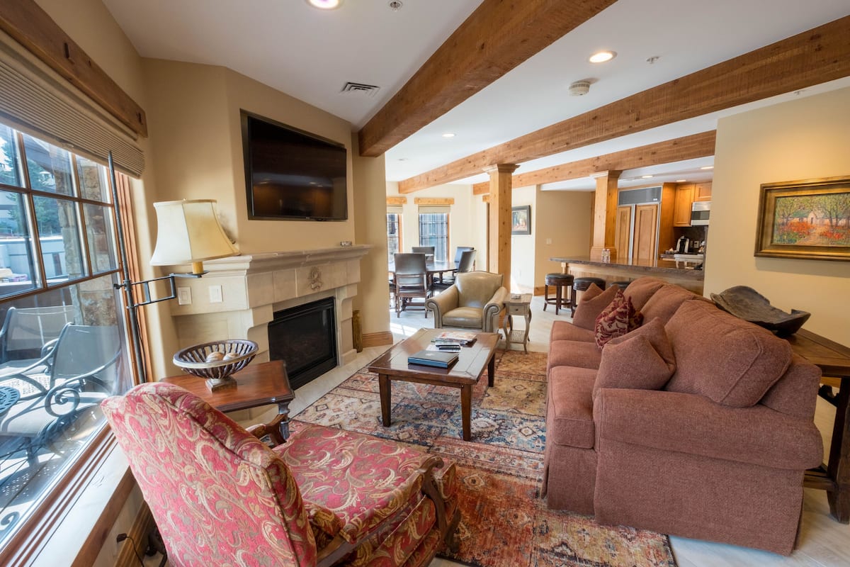 Luxury Suite, 1 Bedroom | Living area | Flat-screen TV, fireplace, DVD player, pay films