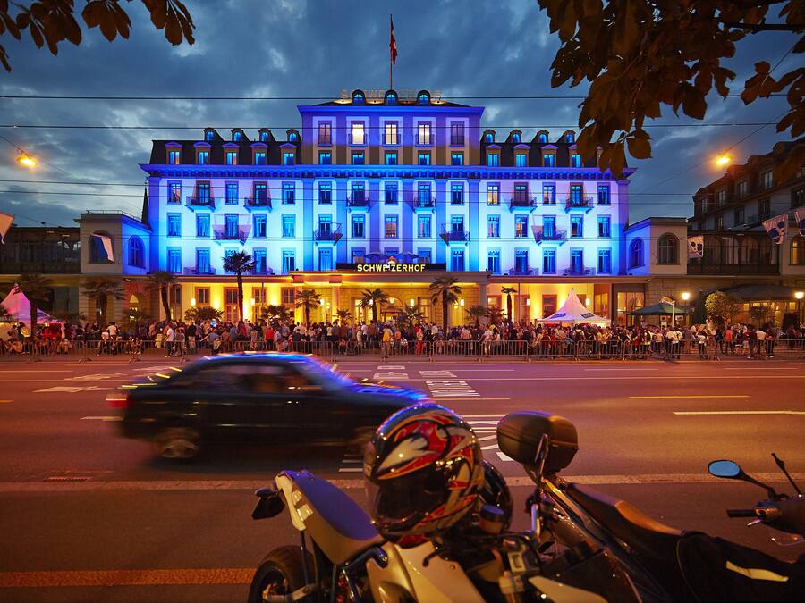 A hotel with a classic European architectural style, featuring multiple stories and balconies.
