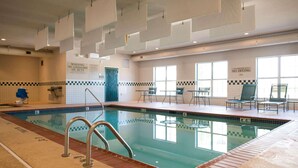 An indoor swimming pool with clear lane markings, a lifeguard chair, and a no diving sign. - Country Inn & Suites by Radisson, Effingham, IL (Effingham)