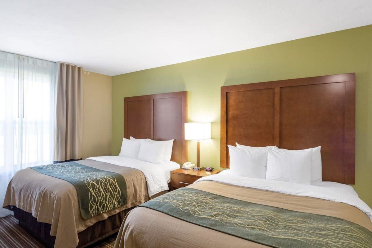 desk, blackout curtains, iron/ironing board, free cots/infant beds