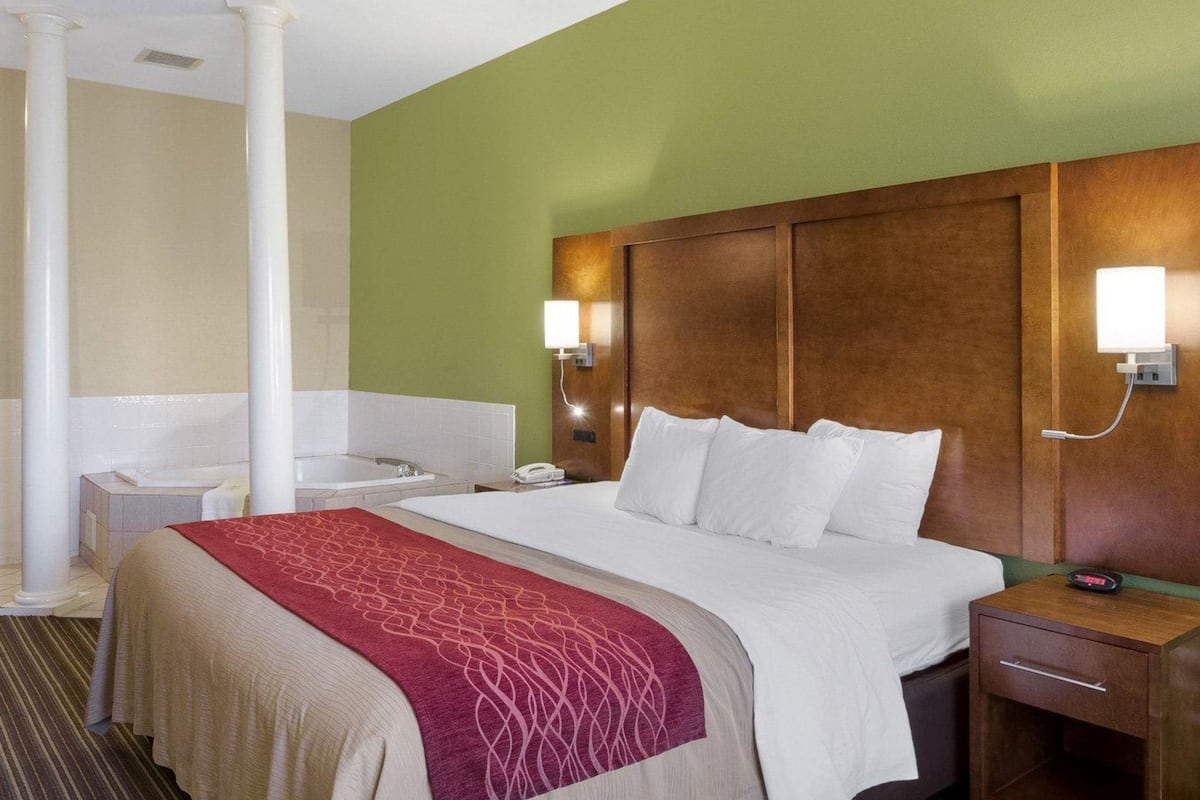 desk, blackout curtains, iron/ironing board, free cots/infant beds