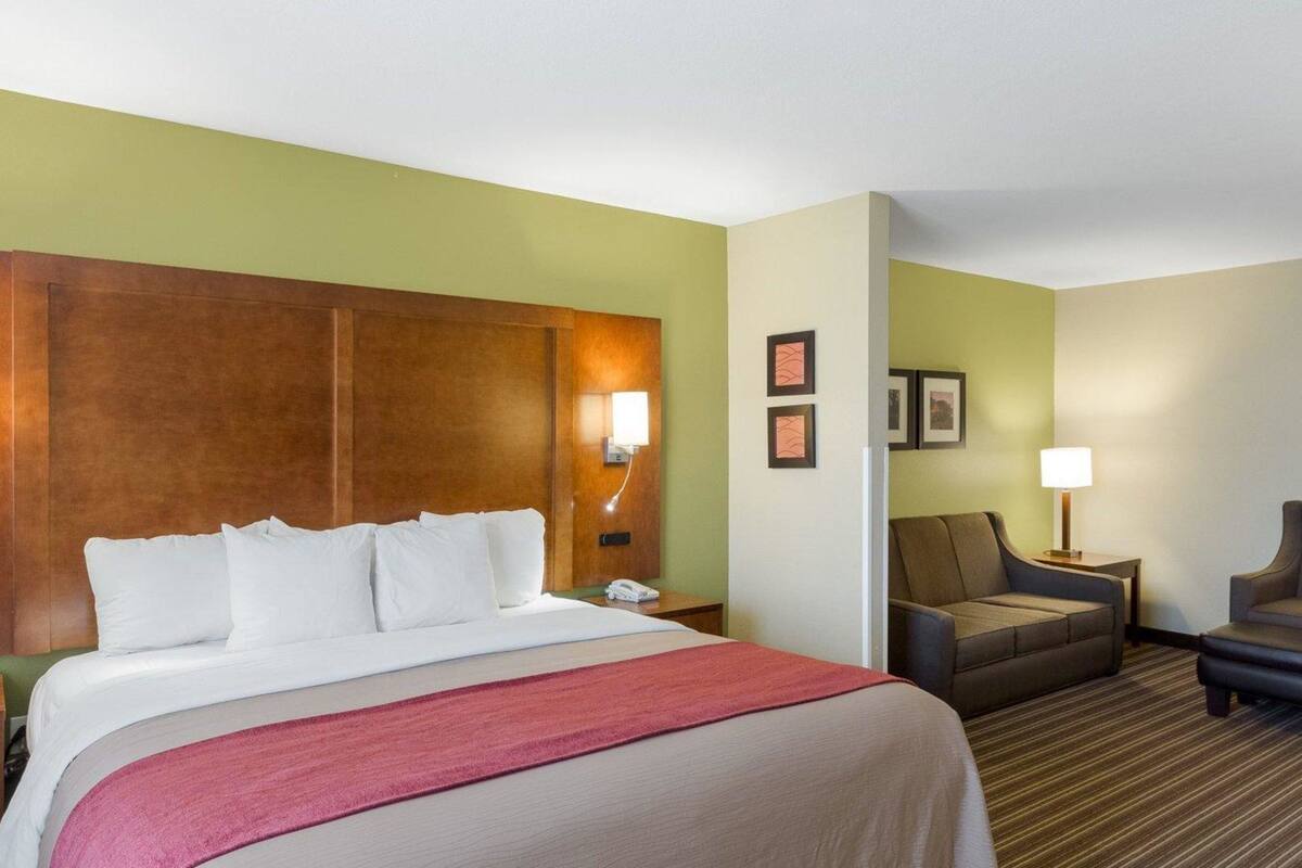 desk, blackout curtains, iron/ironing board, free cots/infant beds