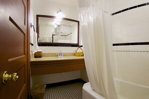 Suite, 1 King Bed | Bathroom | Combined shower/tub, free toiletries, hair dryer, towels