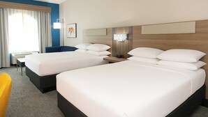 A hotel room with two beds, a desk, and a chair. - Holiday Inn Express Hotel & Suites Pittsburgh-South Side by IHG (Pittsburgh)