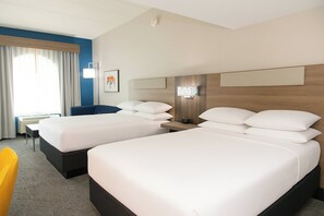 A hotel room with two beds, a desk, and a chair. - Holiday Inn Express Hotel & Suites Pittsburgh-South Side by IHG (Pittsburgh)