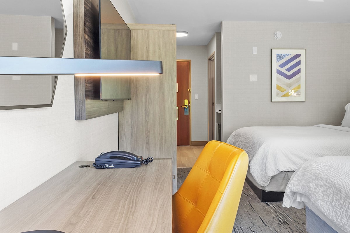 Desk, blackout drapes, iron/ironing board, cribs/infant beds