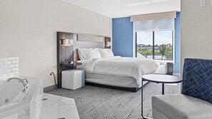 Suite, 1 King Bed, Jetted Tub | In-room safe, desk, blackout curtains, iron/ironing board