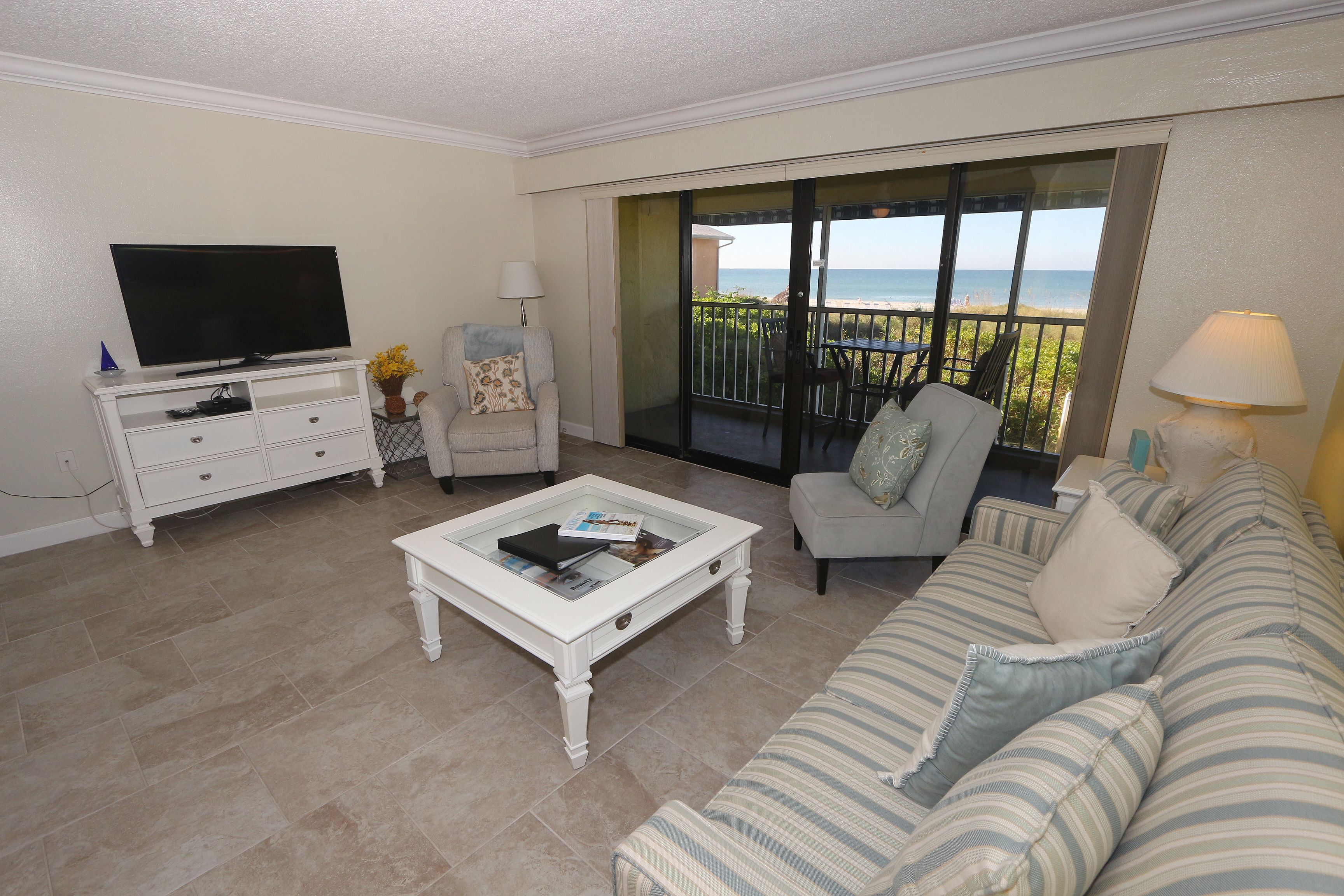 Two bedroom/  two bath gulfront | Living area | TV, DVD player