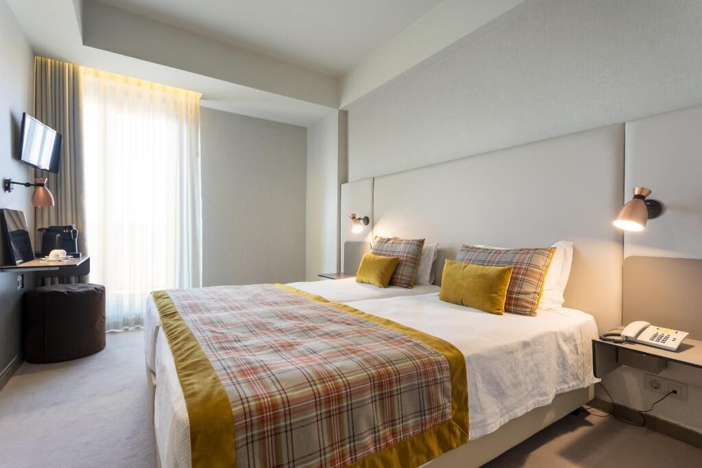 Desk, blackout curtains, free WiFi, bed sheets