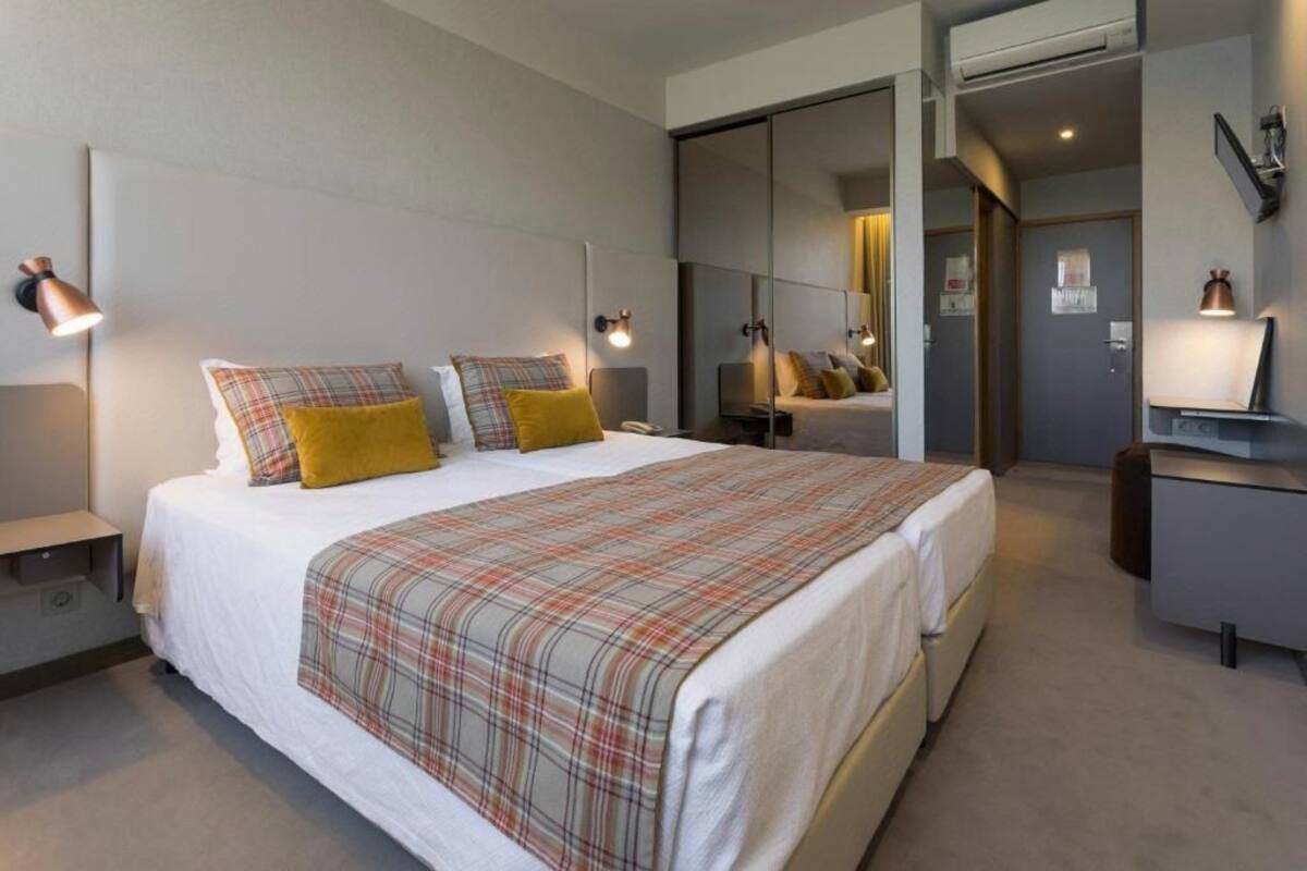 Desk, blackout curtains, free WiFi, bed sheets