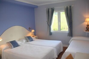 Standard Triple Room, Garden View | Individually decorated, rollaway beds, free WiFi