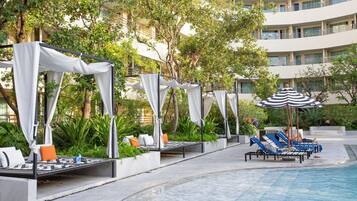 Outdoor pool, open 7:00 AM to 7:00 PM, free pool cabanas, pool umbrellas