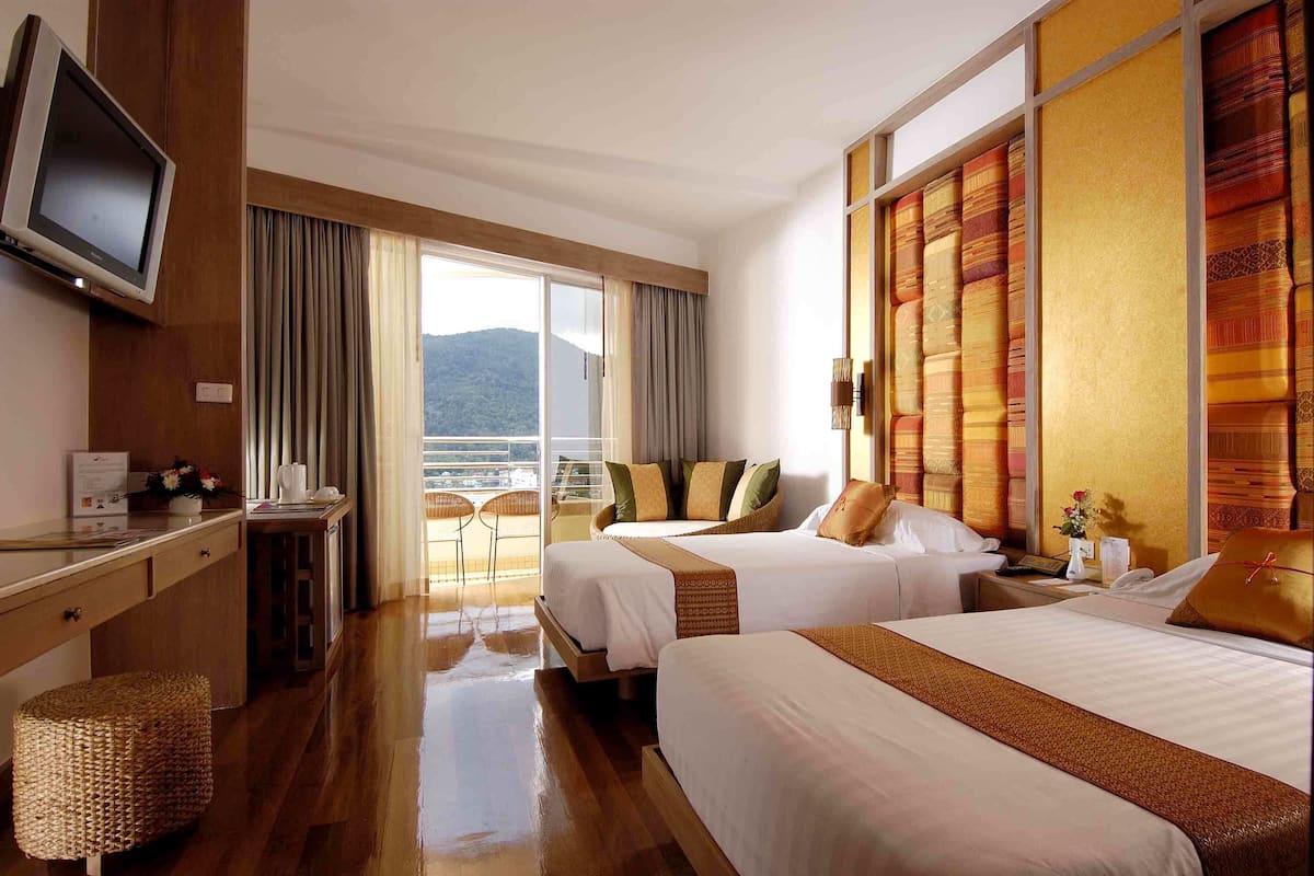 Premier Room, 2 Twin Beds, Partial Sea View | Minibar, in-room safe, desk, laptop workspace