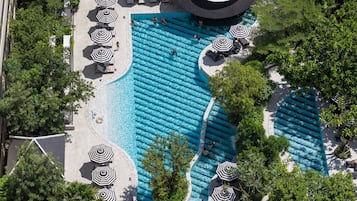 Outdoor pool, open 7:00 AM to 7:00 PM, free cabanas, pool umbrellas