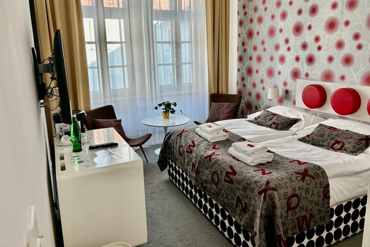Deluxe tweepersoonskamer | 1 slaapkamer, een kluis op de kamer, individueel gedecoreerd