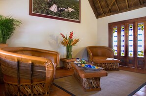 Honeymoon Loft, 1 King Bed, Bathtub, Pool View | Living room | 29-inch flat-screen TV with cable channels, TV