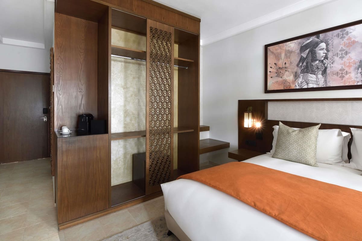 Habitación Deluxe, 1 cama King size, vista al océano (and Pool View) | Sábanas de algodón egipcio, ropa de cama de alta calidad y minibar