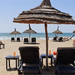 On the beach, white sand, beach towels