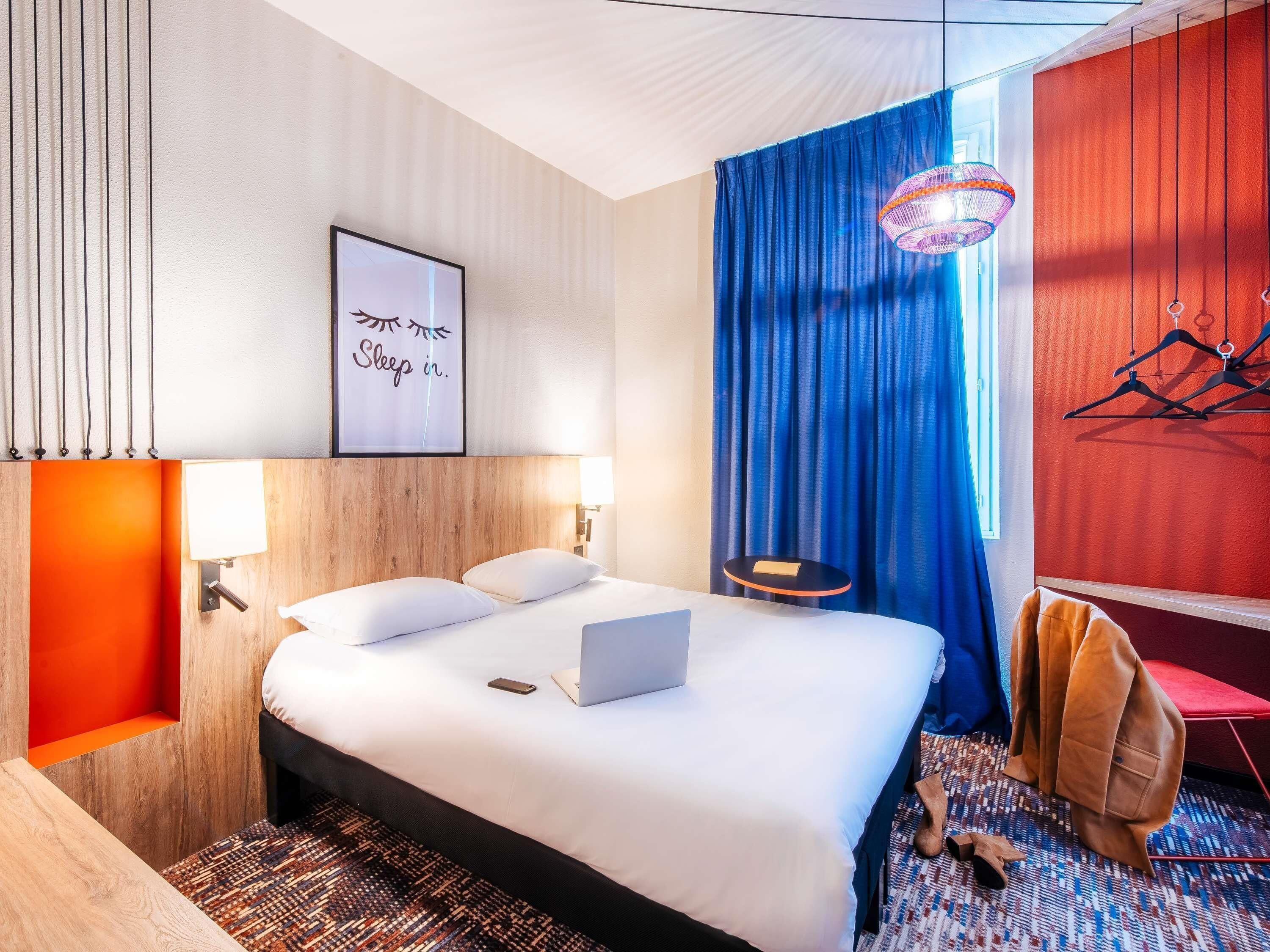 Premium bedding, pillow-top beds, blackout curtains, iron/ironing board