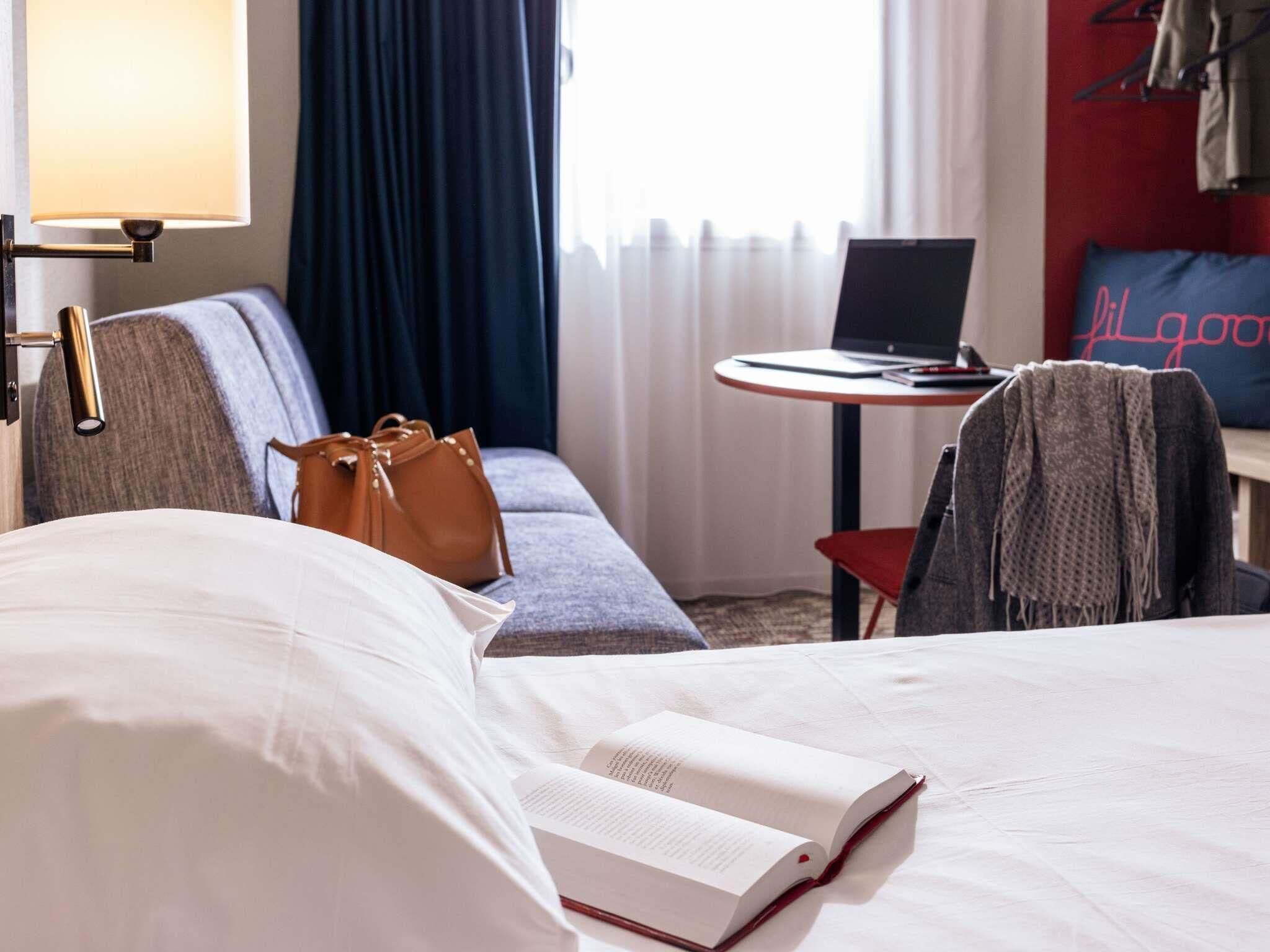 Suite superior | Ropa de cama de alta calidad, camas con pillow-top y cortinas blackout 