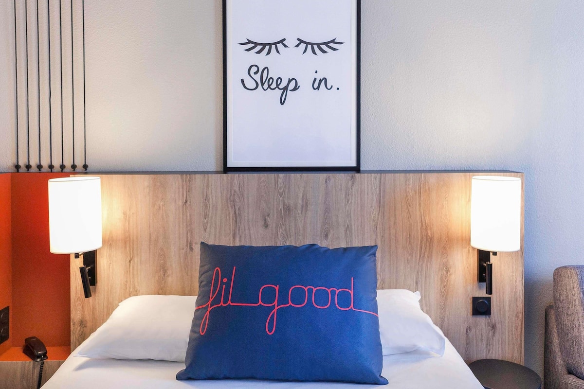 Premium bedding, pillow-top beds, blackout curtains, iron/ironing board