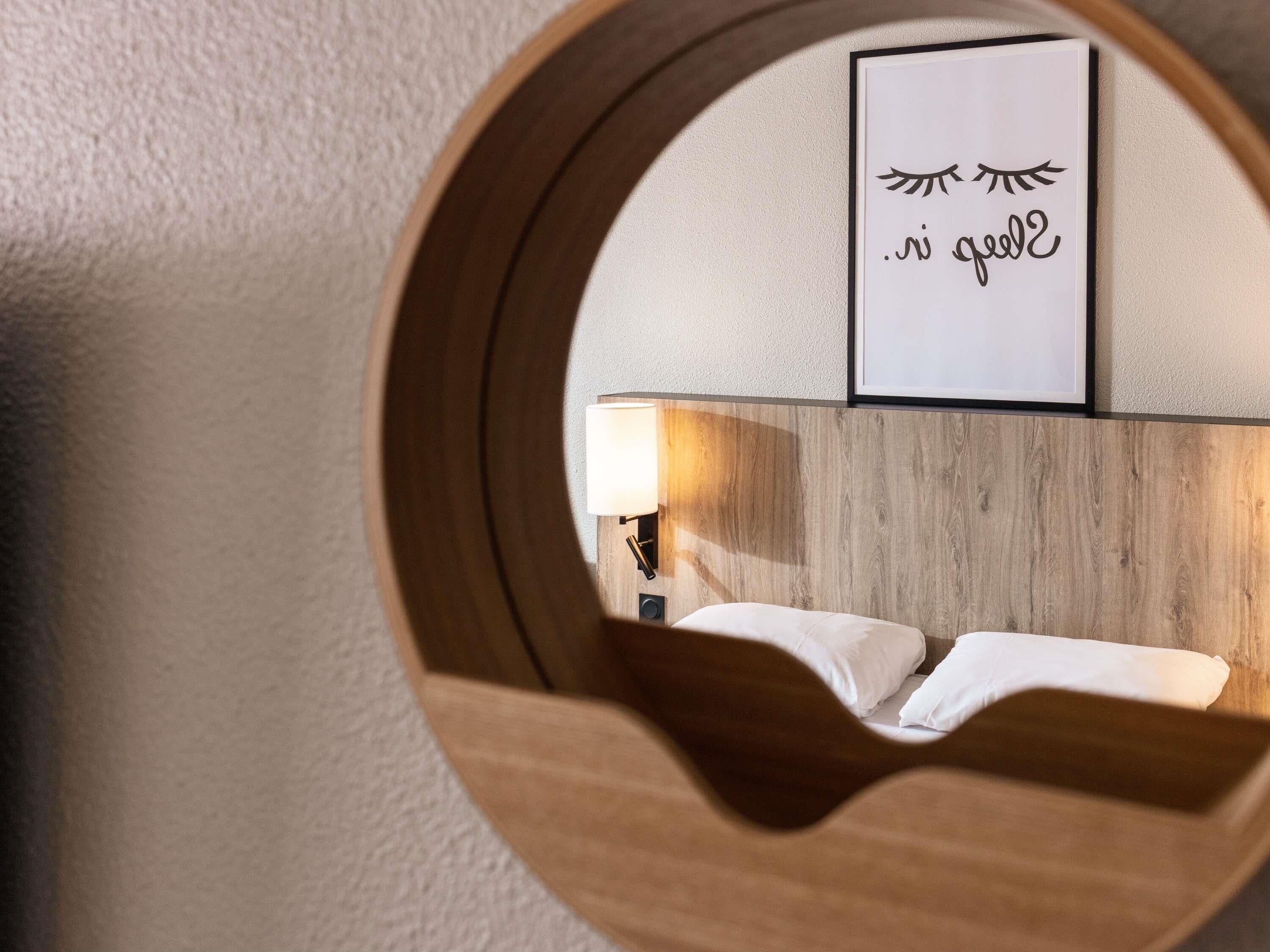 Premium bedding, pillow-top beds, blackout curtains, iron/ironing board