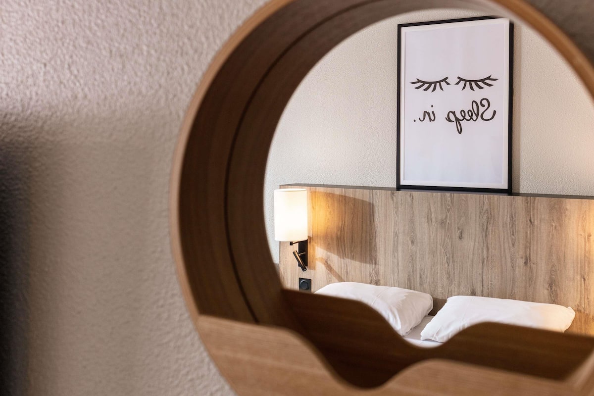 Premium bedding, pillow-top beds, blackout curtains, iron/ironing board